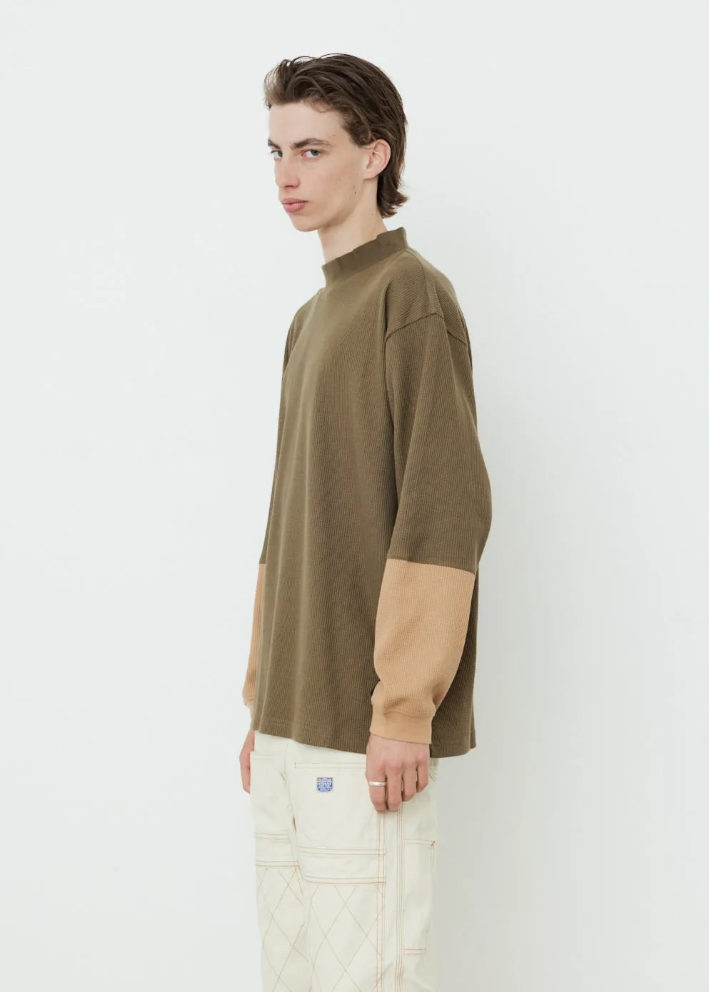 Dipped Mock Neck Long Sleeve Top